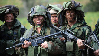 Illustration for article titled Project Run-a-Way: The Craziest Combat Outfits